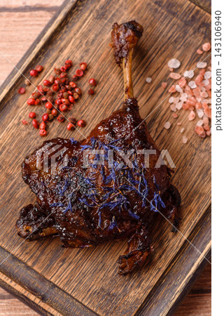 Duck leg confit roasted with salt and allspice. Duck leg confit Duck leg confit roasted with salt and allspice. Duck leg confit 143106940
