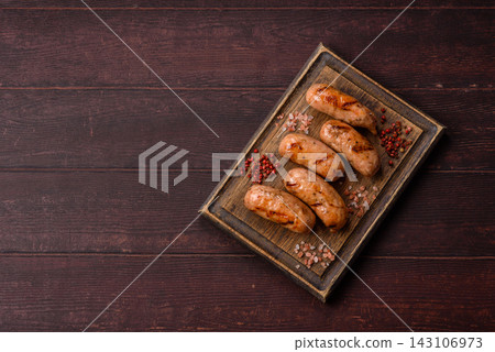 Grilled chicken or pork sausages seasoned with salt and spices. Grilled sausages Grilled chicken or pork sausages seasoned with salt and spices. Grilled sausages 143106973