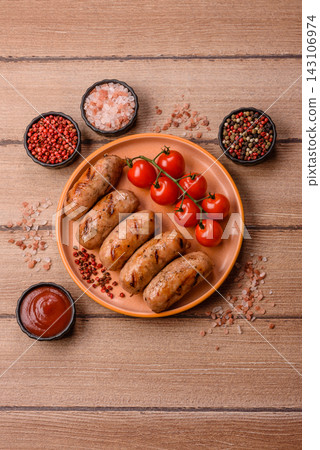 Grilled chicken or pork sausages seasoned with salt and spices. Grilled sausages Grilled chicken or pork sausages seasoned with salt and spices. Grilled sausages 143106974