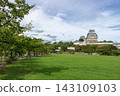 Himeji Castle, standing on a lawn. 143109103