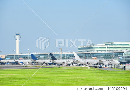 Haneda Airport Terminal 3, control tower, and parked passenger aircraft (Ota Ward, Tokyo) Haneda Airport Terminal 3, control tower, and parked passenger aircraft (Ota Ward, Tokyo) 143109994
