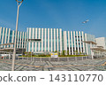 A passenger plane flying over Haneda Innovation City (Ota Ward, Tokyo) 143110770