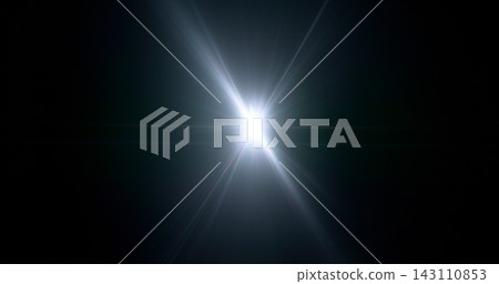 Intense cinematic light flare radiating from a bright source on dark background. Realistic optical effect ideal for film production, visual effects and dramatic compositions. Intense cinematic light flare radiating from a bright source on dark background. Realistic optical effect ideal for film production, visual effects and dramatic compositions. 143110853