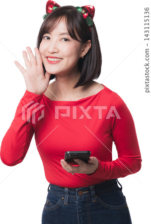 Happy young asian woman holding smartphone cheering holiday offer discount promoting seasonal christmas sale black friday shopping deal event standing against isolated plain background Happy young asian woman holding smartphone cheering holiday offer discount promoting seasonal christmas sale black friday shopping deal event standing against isolated plain background 143115136