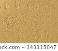 Beige plaster wall texture background with subtle rough surface details 143115647