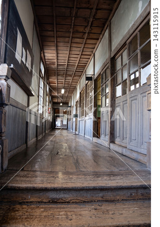 A scene from the corridor of an old wooden school building A scene from the corridor of an old wooden school building 143115915