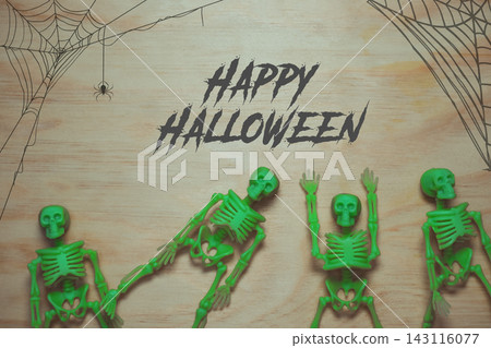 Green Skeleton Decorations with Happy Halloween Text Green Skeleton Decorations with Happy Halloween Text 143116077