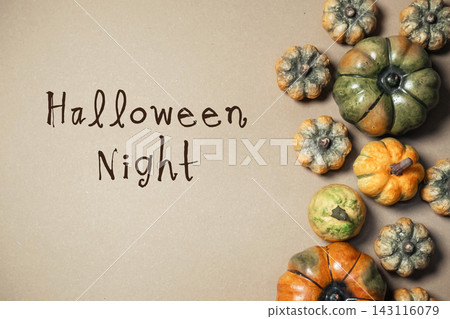 Assorted Decorative Pumpkins with Halloween Night Text Assorted Decorative Pumpkins with Halloween Night Text 143116079