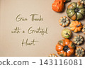 Thanksgiving Message with Decorative Pumpkins on Beige Background 143116081