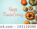 Thanksgiving Greeting with Decorative Pumpkins on Blue Background 143116086