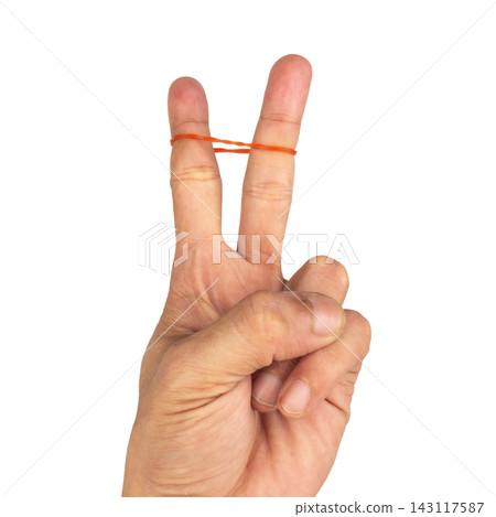A pile of red rubber bands isolated on white background hand A pile of red rubber bands isolated on white background hand 143117587