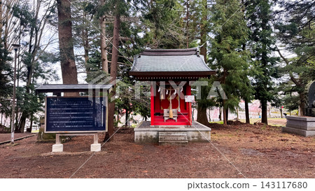 Small Red Auxiliary Shrine among Tall Evergreen Trees Small Red Auxiliary Shrine among Tall Evergreen Trees 143117680