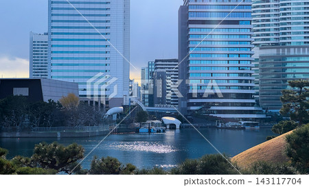 Modern Office Towers Reflected in a Tokyo Waterfront Canal Modern Office Towers Reflected in a Tokyo Waterfront Canal 143117704