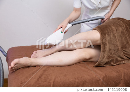 Leg hair removal treatment using a hair removal device on the shins. Leg hair removal treatment using a hair removal device on the shins. 143119008