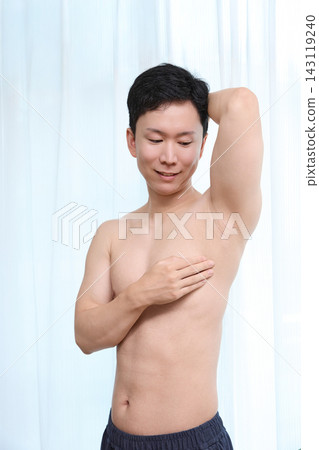 Men who experience the effects of underarm hair removal Men who experience the effects of underarm hair removal 143119240