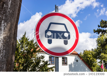 Round road sign restricting motor vehicle access against a blue sky Round road sign restricting motor vehicle access against a blue sky 143119300