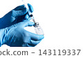 Medical Professional Preparing Syringe with Vial isolated on white background closep with copy space  143119337