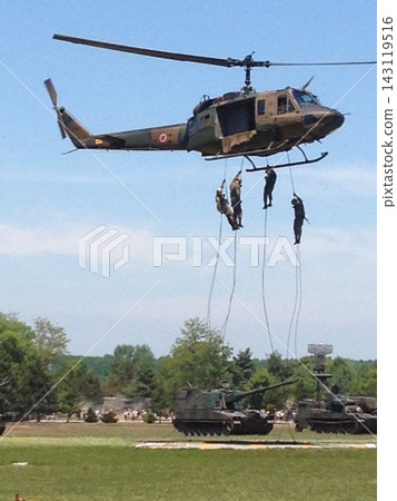 Helicopter rappelling Helicopter rappelling 143119516
