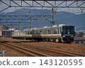 A 6-car 223 series train running on the JR Biwako Line. 143120595
