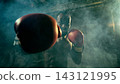 Intense boxer punches directly toward the viewer in a smoky industrial gym Intense boxer punches directly toward the viewer in a smoky industrial gym 143121995