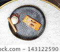 Apple strudel with vanilla ice cream and chocolate shavings in Tienen Apple strudel with vanilla ice cream and chocolate shavings in Tienen 143122590