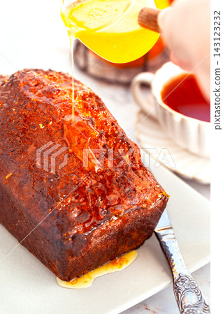 Fresh baking delicious orage loaf cake with syrup Fresh baking delicious orage loaf cake with syrup 143123232
