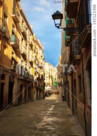Picturesque view of a narrow street in Tarragona city, Spain 143123306