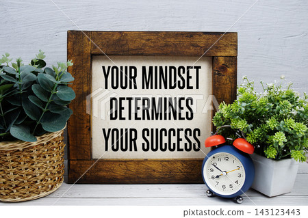 Your Mindset Determines Your Success text written on wooden board Your Mindset Determines Your Success text written on wooden board 143123443