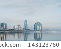 View of Baku embankment and Crescent Hotel by the sea in Azerbaijan at different times of the day 143123760