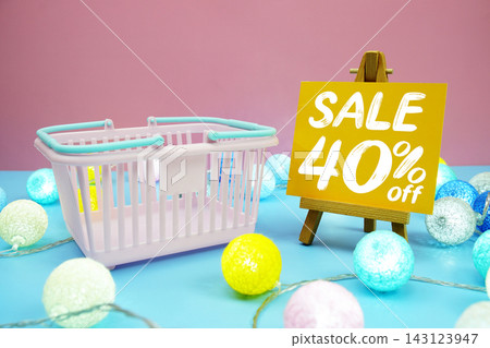 Sale 40% text with shopping basket on blue background Sale 40% text with shopping basket on blue background 143123947