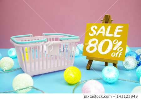 Sale 80% text with shopping basket on blue background Sale 80% text with shopping basket on blue background 143123949