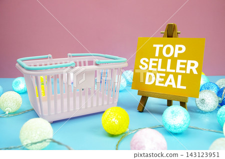 Top Seller Deal text with shopping basket on blue background Top Seller Deal text with shopping basket on blue background 143123951