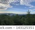 Climbing clouds in the blue sky 143125351
