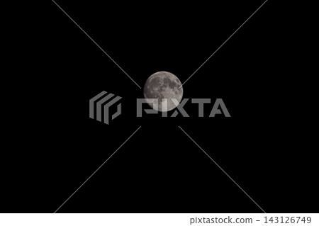 The Mid-Autumn Moon, hidden behind clouds, shines beautifully and ethereally. The Mid-Autumn Moon, hidden behind clouds, shines beautifully and ethereally. 143126749
