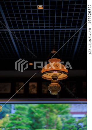 A restaurant with retro lamps and a relaxed atmosphere. A restaurant with retro lamps and a relaxed atmosphere. 143126862