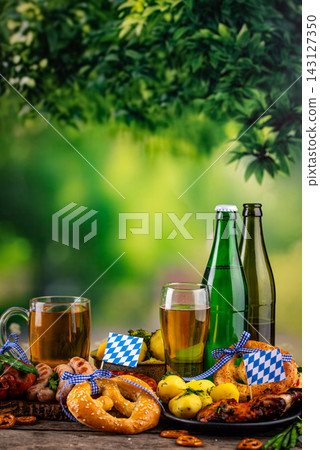 Oktoberfest food: beer, pretzel, sausages, stewed cabbage, potato Oktoberfest food: beer, pretzel, sausages, stewed cabbage, potato 143127350