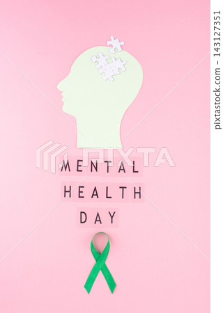Mental Health Day with green ribbon Mental Health Day with green ribbon 143127351