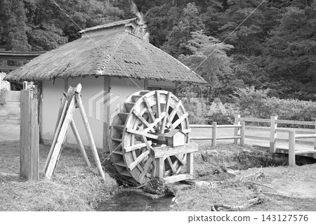 Landscape with a water wheel Landscape with a water wheel 143127576
