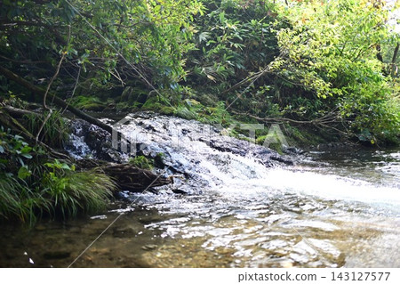River flowing between rocks River flowing between rocks 143127577