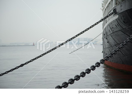 Chains of ships moored in the harbor Chains of ships moored in the harbor 143128259