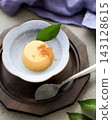 Steamed pudding made in a bamboo steamer 143128615