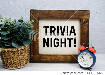 Trivia Night! text written on wooden board Trivia Night! text written on wooden board 143132668