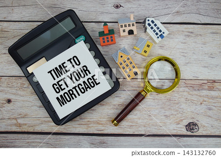 Ultimate Mortgage Checklist text with house model, calculator and magnifying glass on wooden background Ultimate Mortgage Checklist text with house model, calculator and magnifying glass on wooden background 143132760