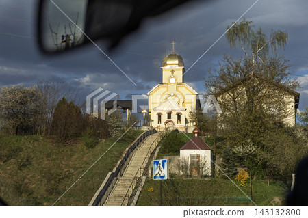 Ukrainian Church on Hill Under Dramatic Stormy Sky Ukrainian Church on Hill Under Dramatic Stormy Sky 143132800