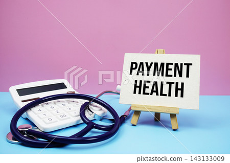 Payment Health text with stethoscope and calculator on pink and blue background Payment Health text with stethoscope and calculator on pink and blue background 143133009