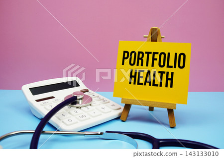 Portfolio Health text with stethoscope and calculator on pink and blue background Portfolio Health text with stethoscope and calculator on pink and blue background 143133010
