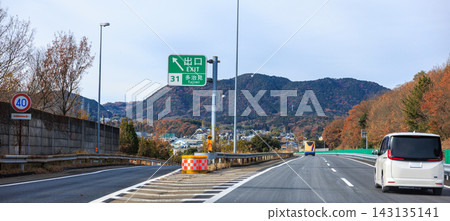 Autumn foliage in the mountains and a view of the Chuo Expressway from the main road. Autumn foliage in the mountains and a view of the Chuo Expressway from the main road. 143135141