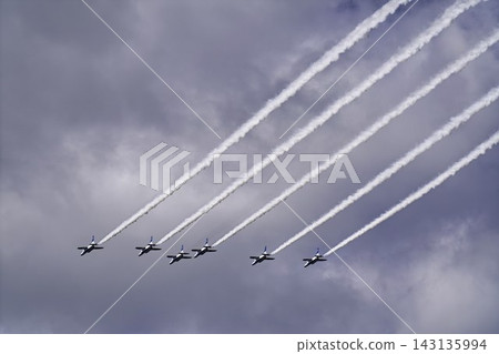 Blue Impulse aerobatic team at Matsushima Air Base conducts flight training under the autumn blue sky in Higashimatsushima City, Miyagi Prefecture. Blue Impulse aerobatic team at Matsushima Air Base conducts flight training under the autumn blue sky in Higashimatsushima City, Miyagi Prefecture. 143135994