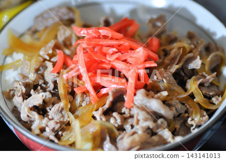 stir fried beef with vegetable and rice or Rice topped with stir fried pork or stir fried beef or Japanese food or Korean food or Beef Rice Bowl , Gyudon stir fried beef with vegetable and rice or Rice topped with stir fried pork or stir fried beef or Japanese food or Korean food or Beef Rice Bowl , Gyudon 143141013