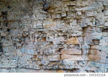Layers of rock face strata and natural textures Layers of rock face strata and natural textures 143141318